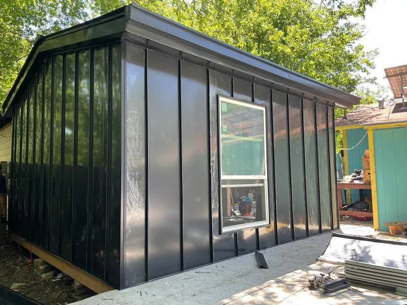 Black standing seam metal wall panels for Metal Roof Installation in Oak Bluffs