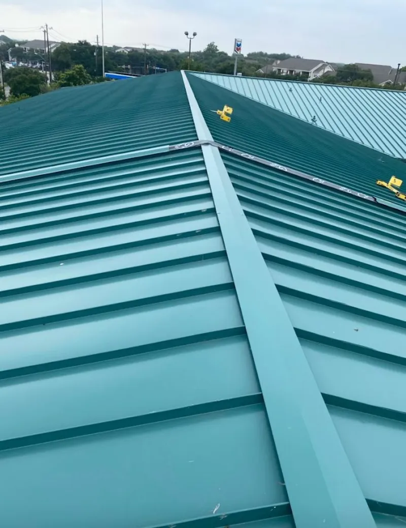 Green commercial metal roof ridge and valley for Metal Roof Repair in Oak Bluffs